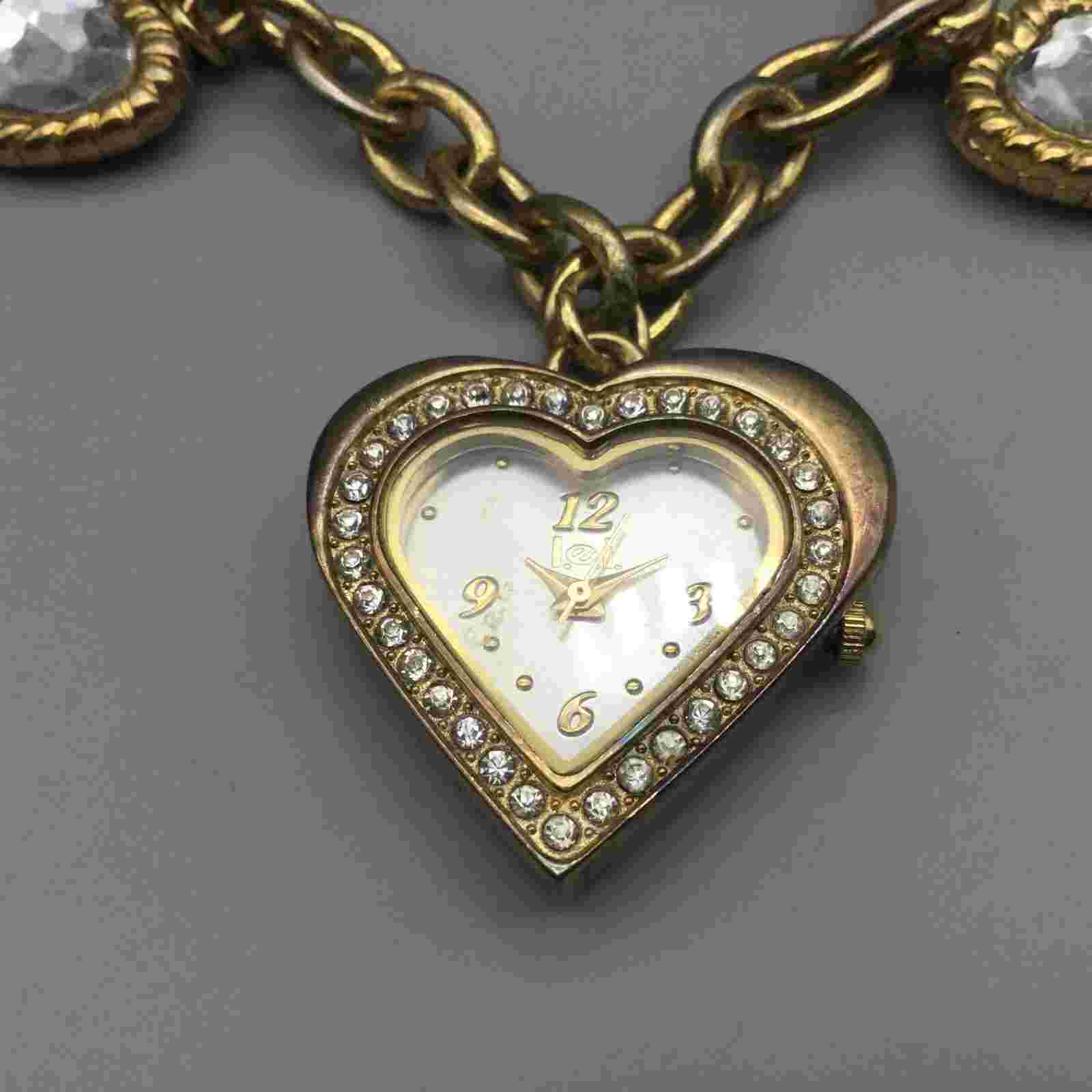 L.E.I. Heart Charm Bracelet Watch Women 31mm Gold Tone New Battery 7.25"