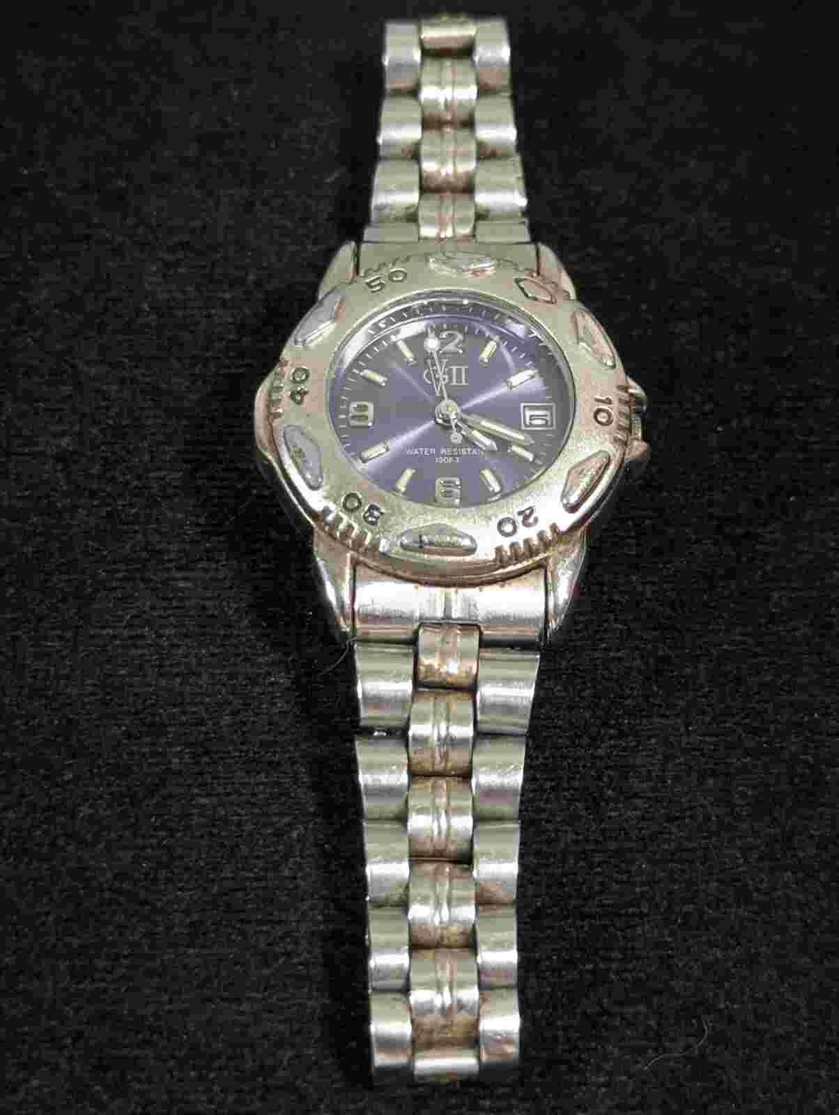 Gloria Vanderbilt II Date Indicator Rotating Bezel Stainless Steel Band Watch