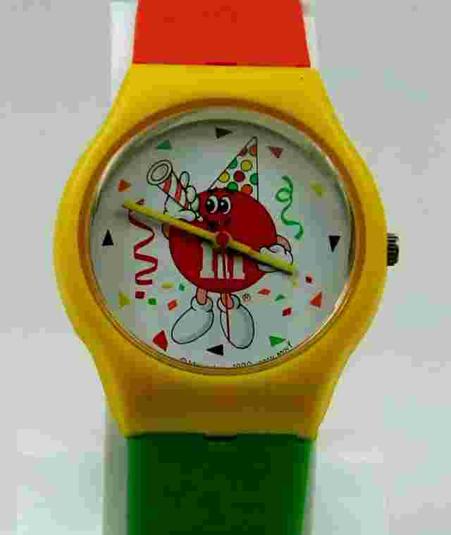M & M COLLECTIBLE 50TH BIRTHDAY WATCH, NEW BATTERY, GREEN AND RED BAND