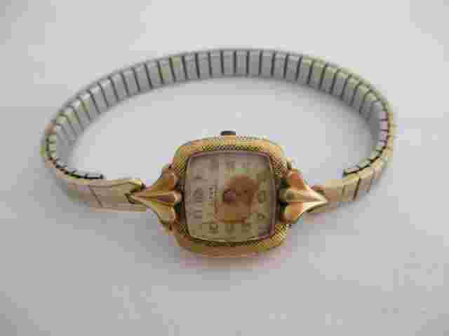 Clyda Women's Gold Toned Stretch Band Vintage Wind Up Analog Watch *For Repair*
