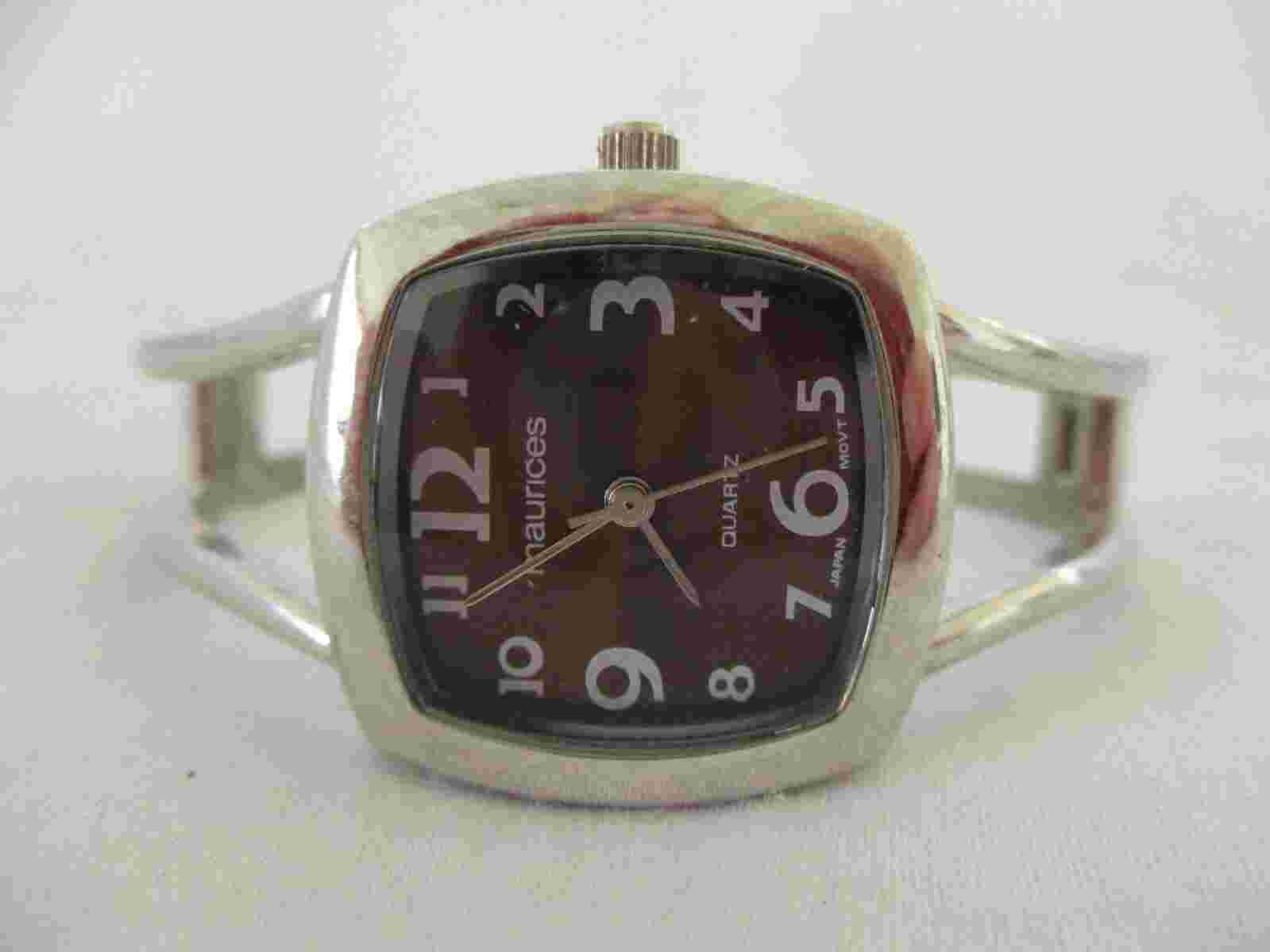 Maurices Analog Wristwatch with a Cuff Band and Quartz Movement