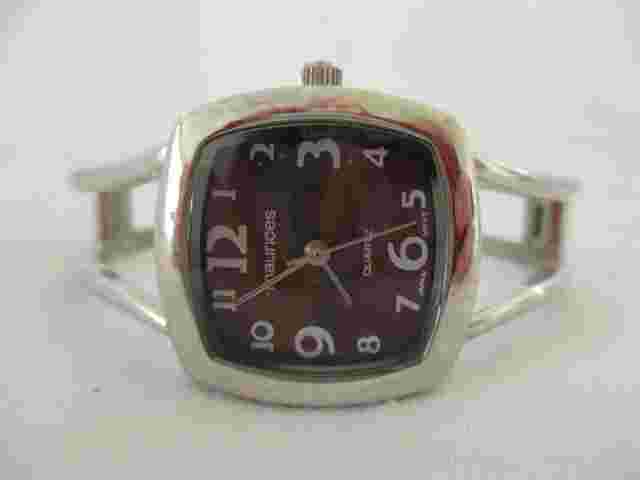 Maurices Analog Wristwatch with a Cuff Band and Quartz Movement