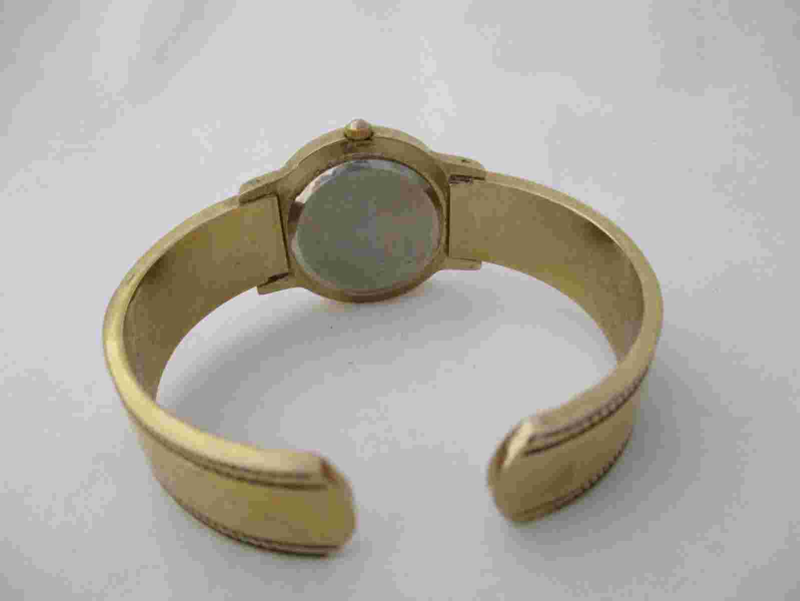 Vernier Women's Gold Toned Cuff Band Analog Watch