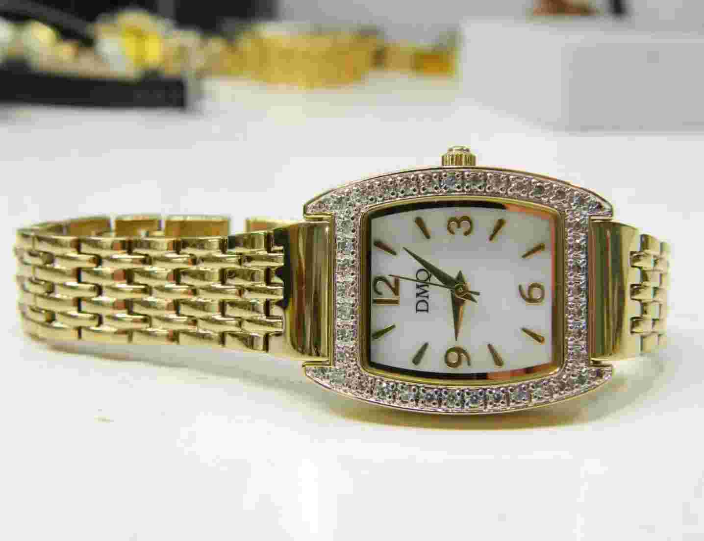 Beautiful DMQ CZ 18k gold plated rhinestone sided Lady's watch