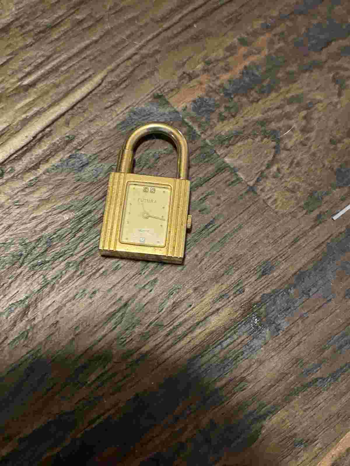 Gold Futura Lock watch