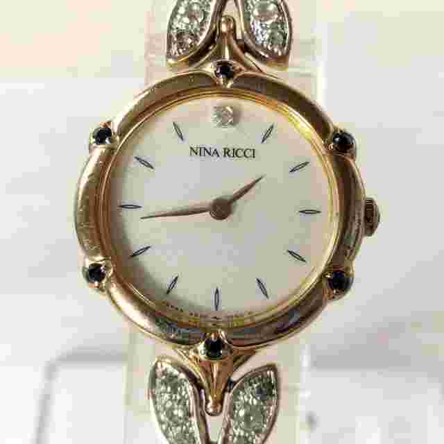 Nina Ricci Women's 4N20-029B Gold Bracelet with Stones Quartz Used Watch