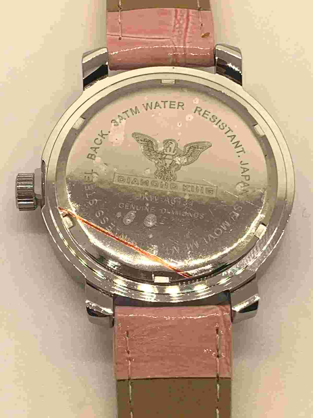 Diamond King Ladies Wristwatch Pink Crocodile Band with Gold Heart Watchface.