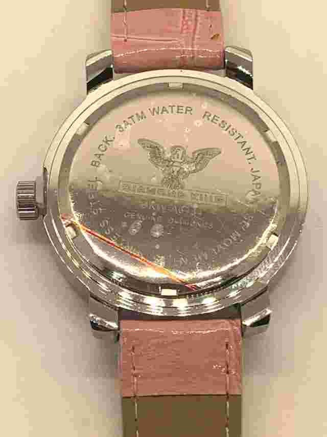 Diamond King Ladies Wristwatch Pink Crocodile Band with Gold Heart Watchface.