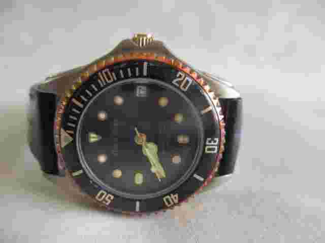 Hugo Maxx Analog Wriswatch with a Buckle Band and 18k Gold Plated