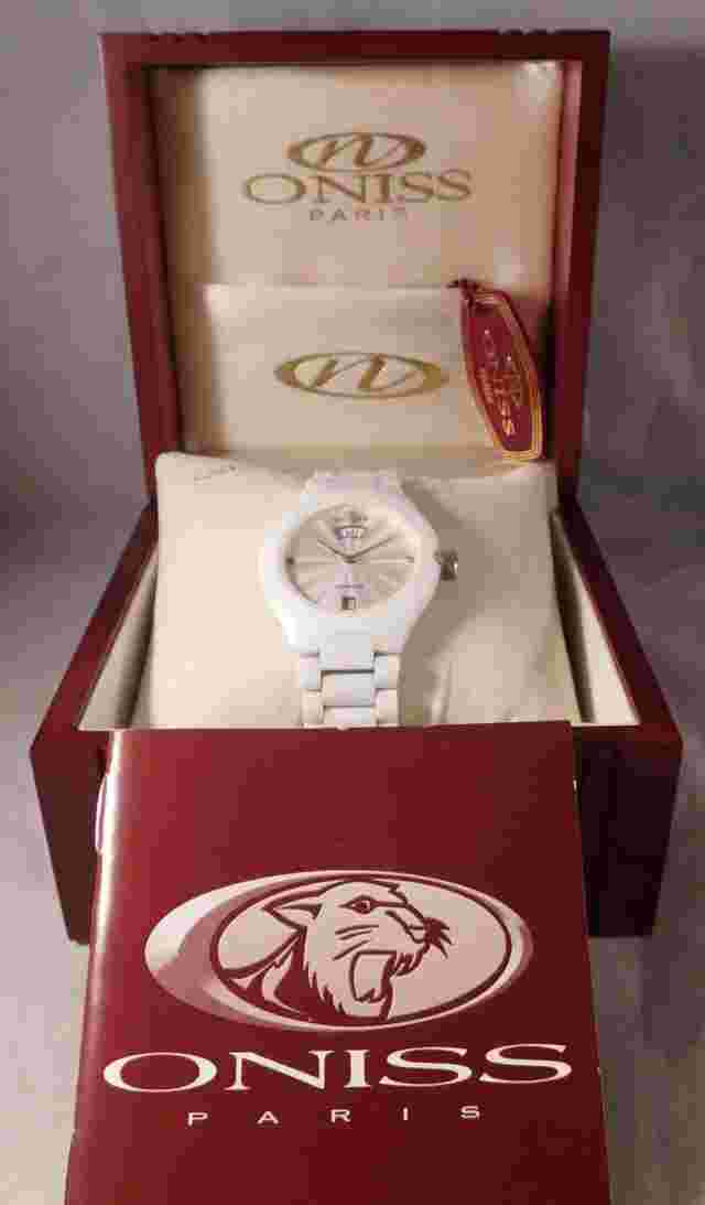 Oniss Paris Elegant Slim White Ceramic Watch With Box, Tag, and Manual....32mm