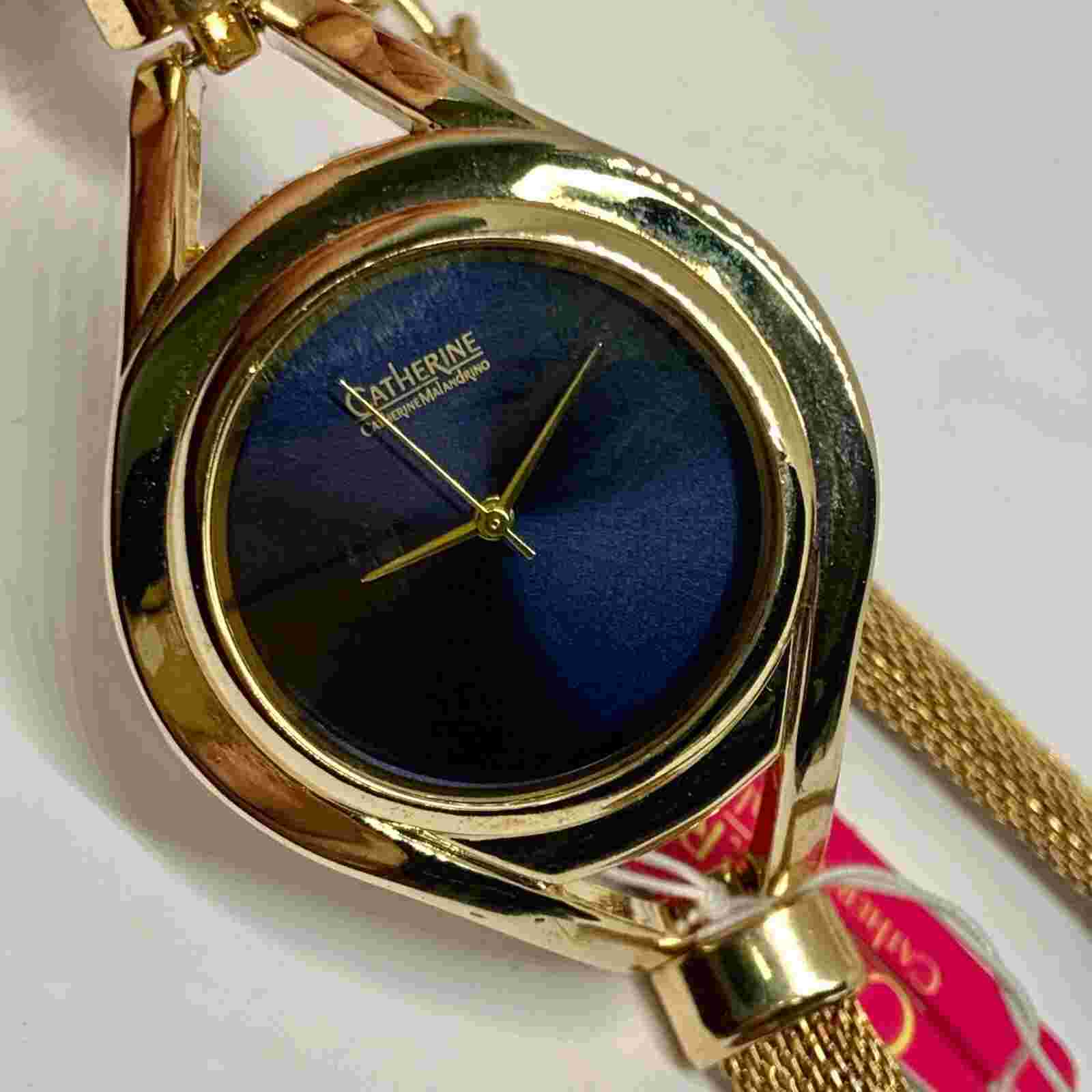 Catherine Malandrino gold tone double wrap band watch 38mm running
