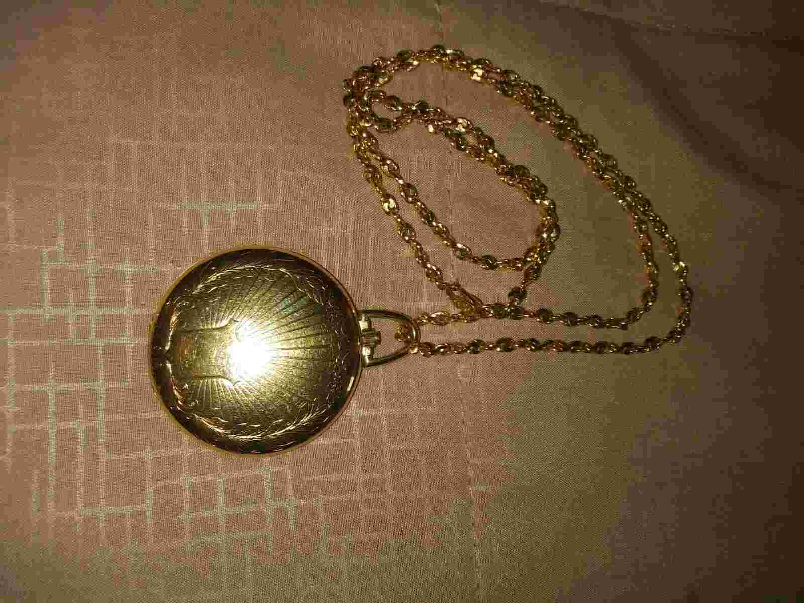 Colibri 17 Jewel Gold Pocket watch with chain, Wind up and in perfect condition.