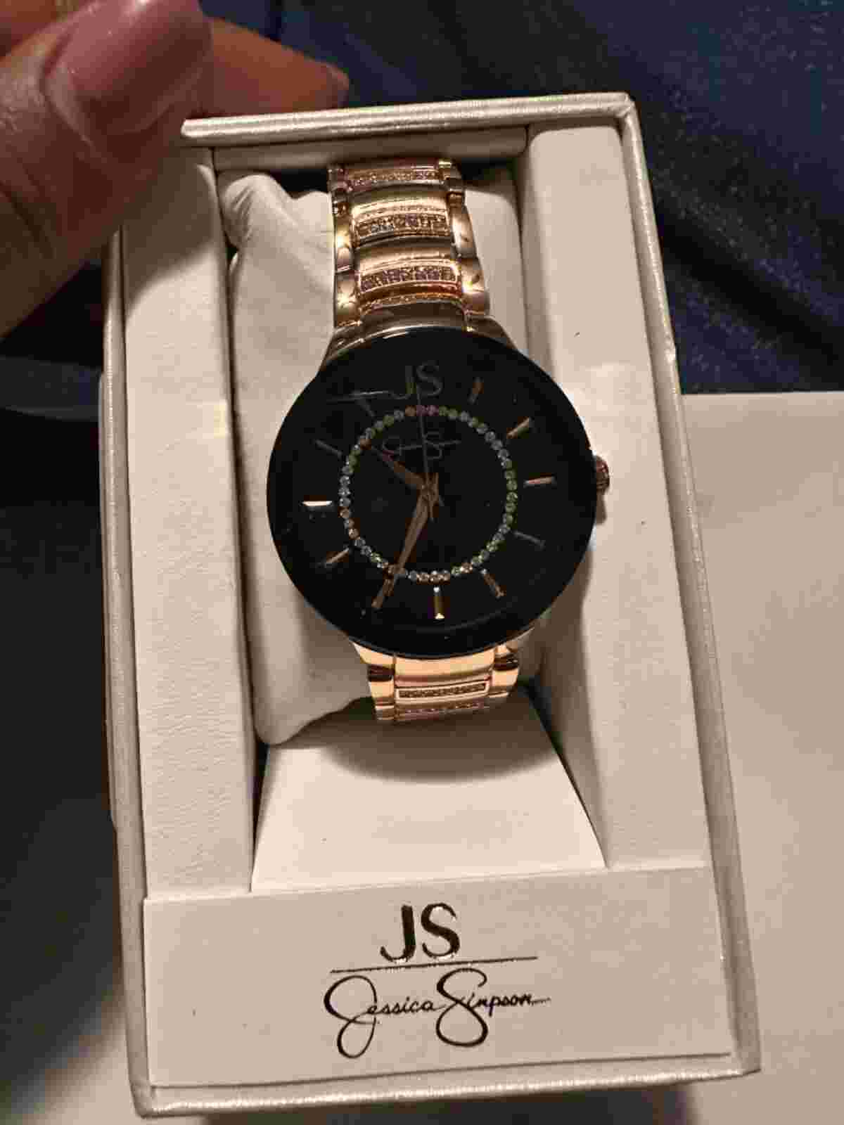 Jessica Simpson rose gold watch with black face