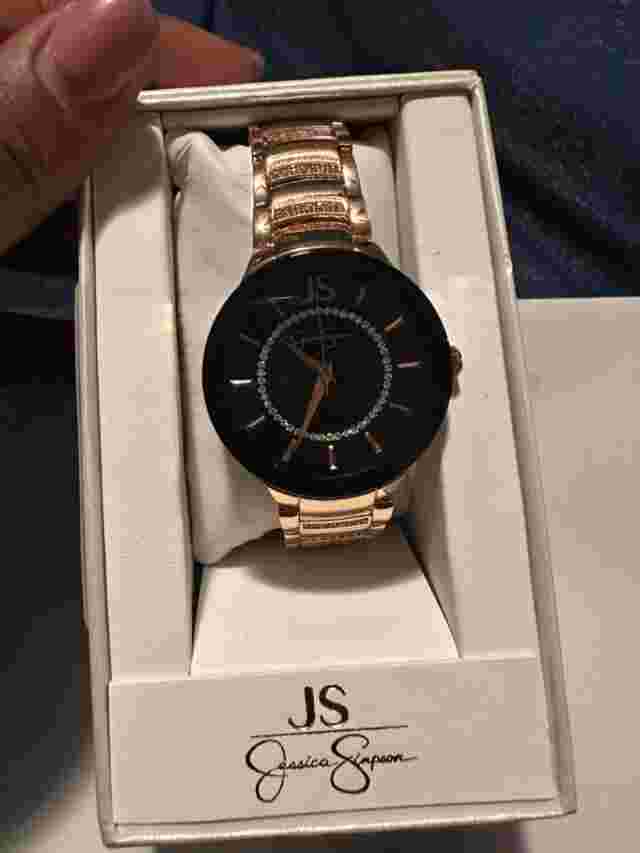 Jessica Simpson rose gold watch with black face