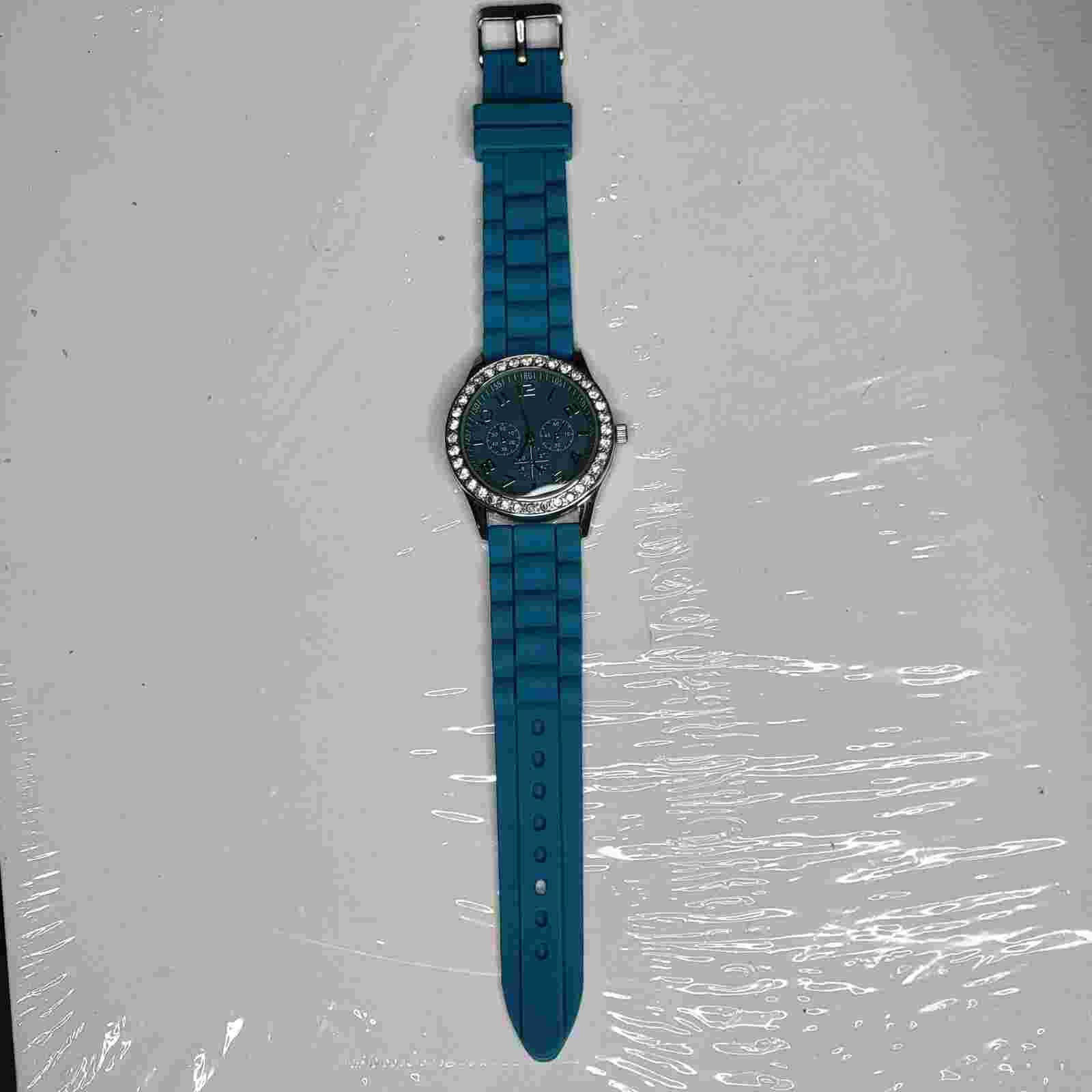 Ladies Darice Silver Tone aqua colored Silicone Band Ladies Rhinestone Watch
