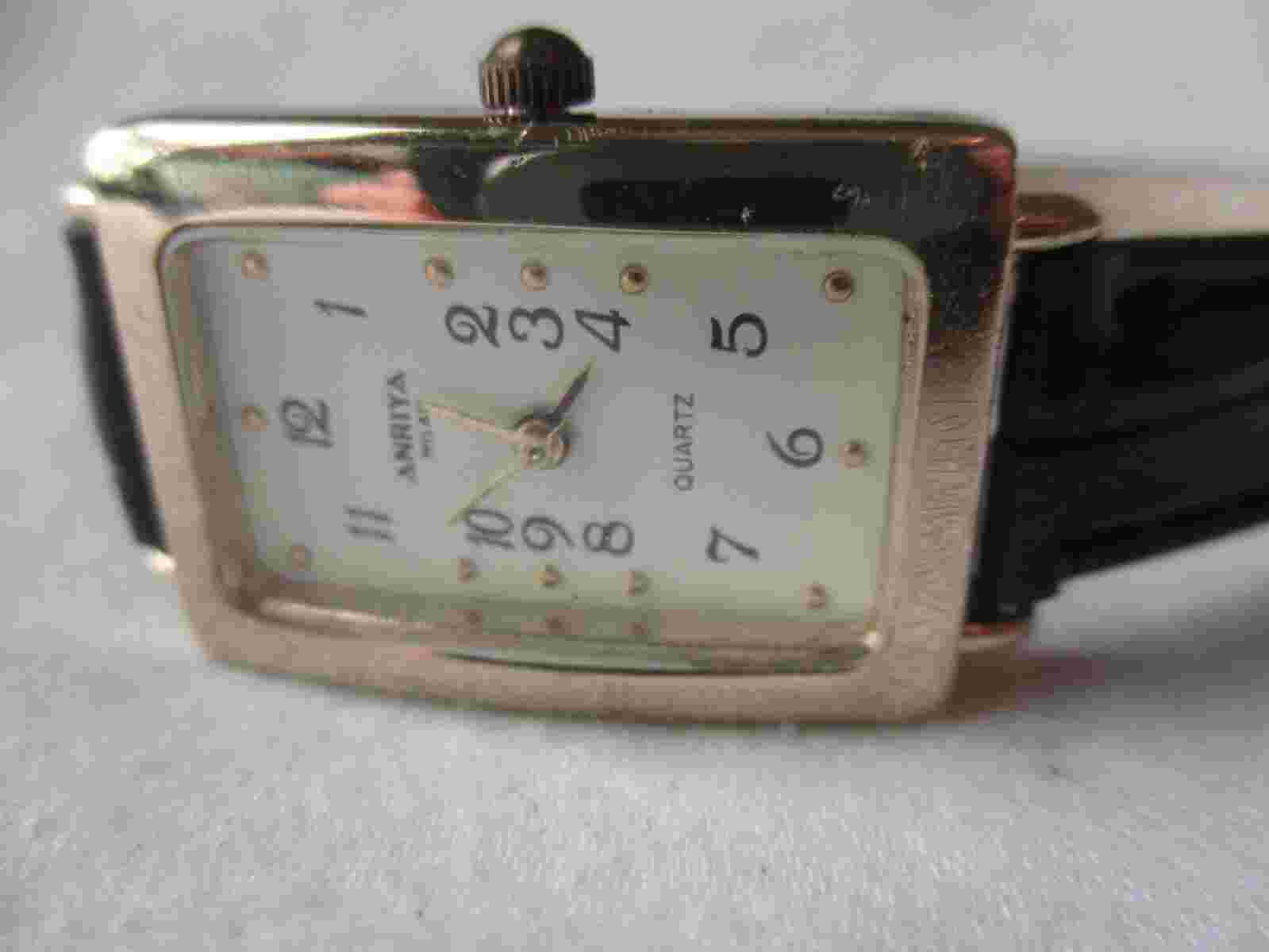 Anriya Milan Analog Wristwatch with a Buckle Band and Quartz Movement