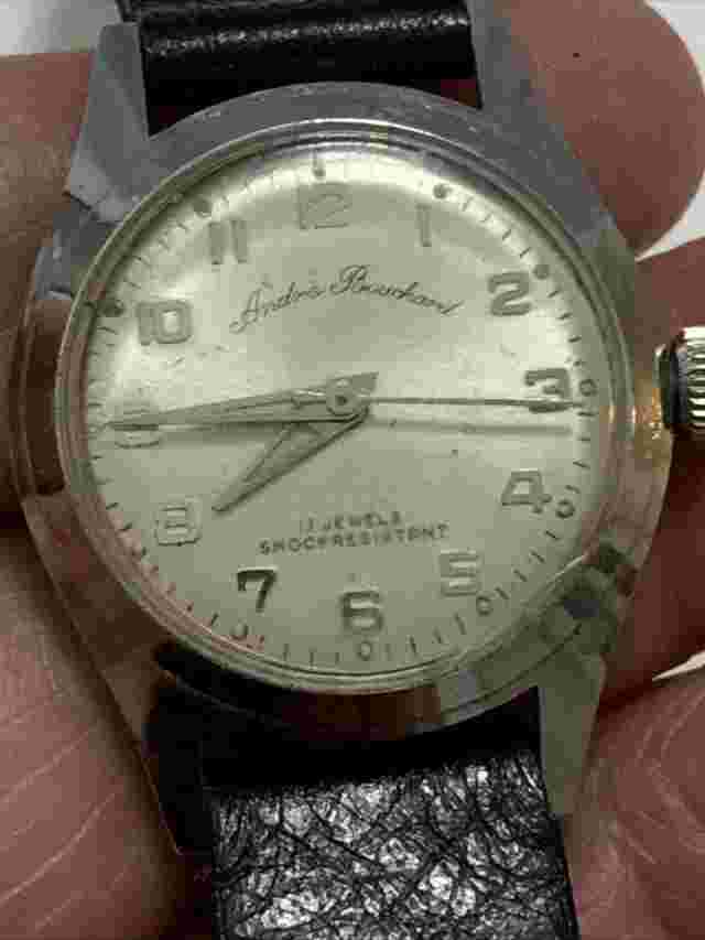 Andre Bouchard unisexwatch 17j, 27mm runs a bit slow, mechanical.stainless