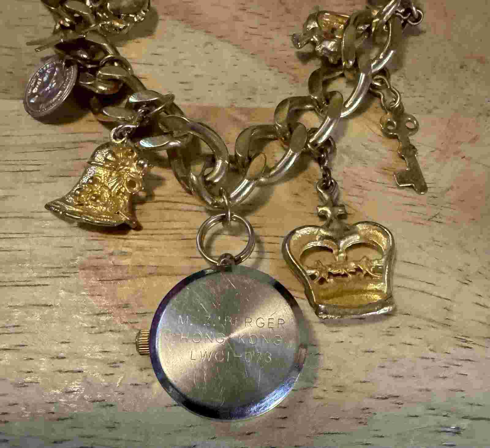 Watch It Gold Tone Charm Bracelet Heart Crown Bell Star 7 inches (Needs Battery)