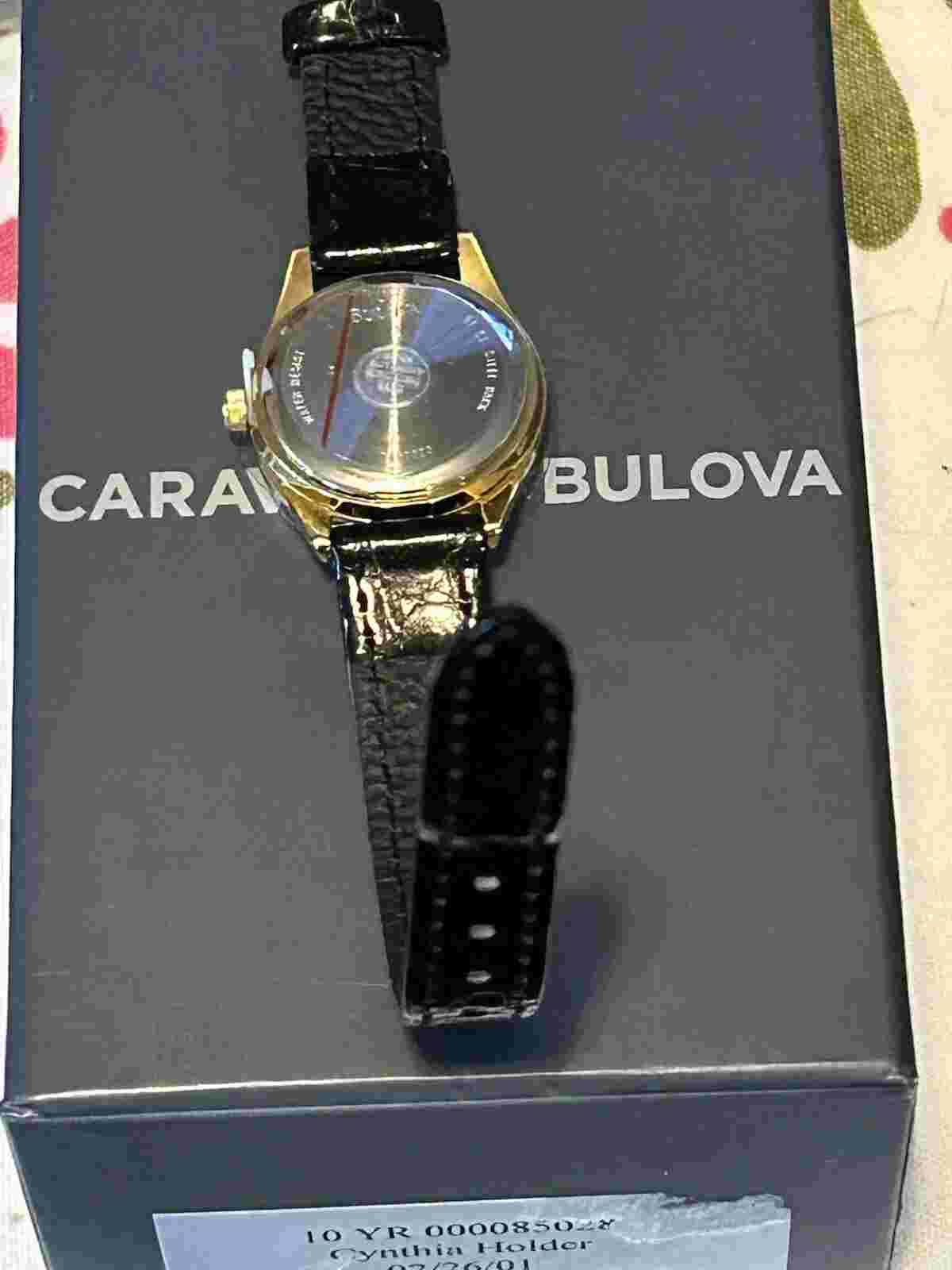 Caravelle by Bulova Watch for Ladies Round GoldTone with Black Band NOS In Box