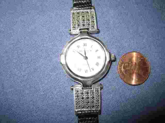 #293  ladys sterling silver  JUDITH JACK   marcasite quartz watch