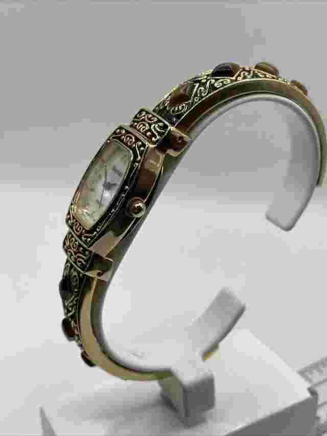 Mayfair women's watch,gold bracelet band with 8 polished stones