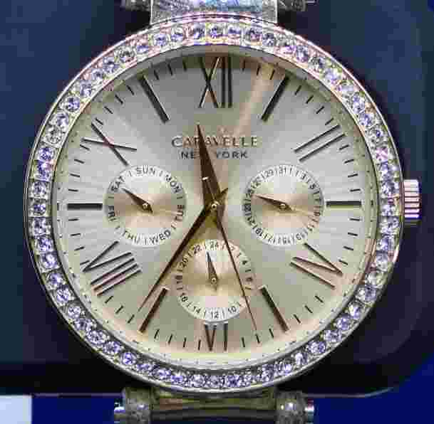 Caravelle New York 44N103 Women's Round Gold Tone Leopard Analog Day Date Watch