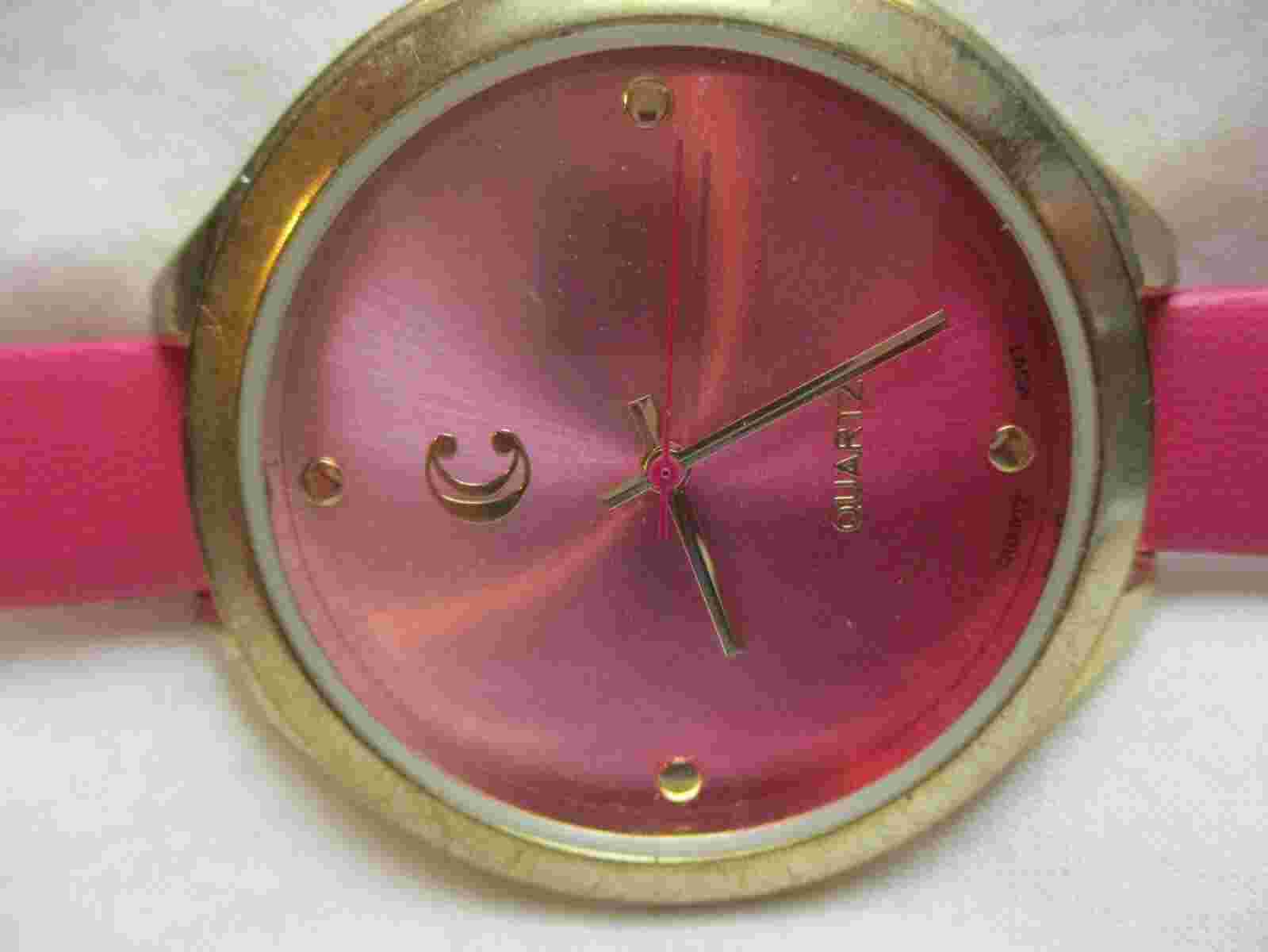 Charming Charlie Analog Wristwatch with a Buckle Band and Quartz Movement