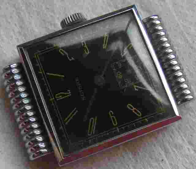 Suisse mens wristwatch nickel chromiun case load manual balance Ok 25,5 mm aside