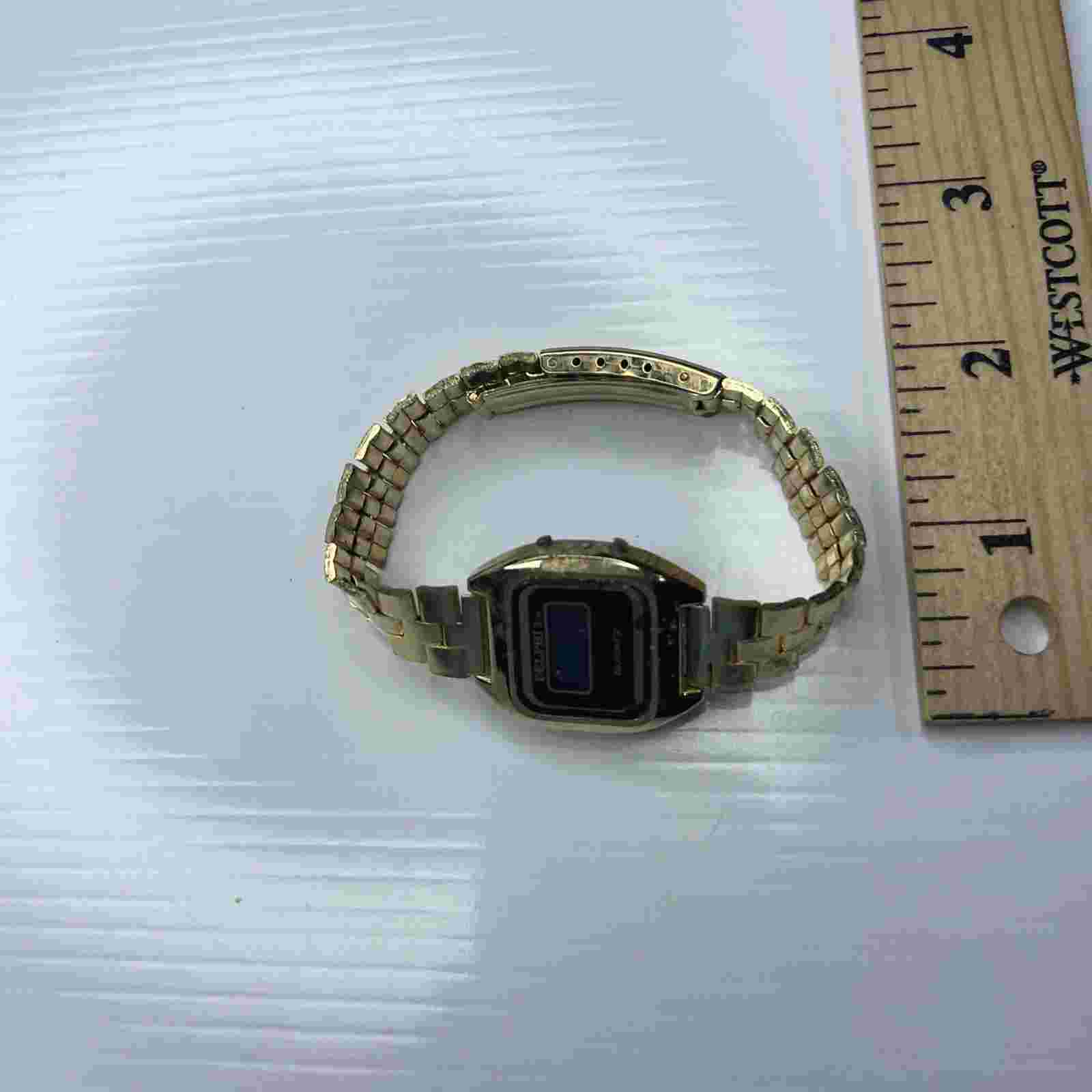 F Delphi II LCD Gold Quartz Hong Kong Watch Untested