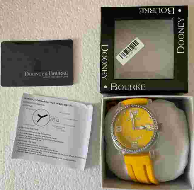 Pre-owned Dooley & Bourne sport watch, yellow band . Needs battery