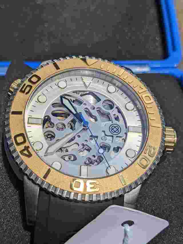 DEEP BLUE 44MM AUTOMATIC SKELETON DIVER GOLD BEZEL - SILVER SKELETON DIAL