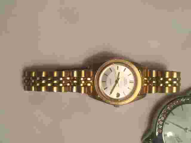 MAN AND WOMAN WATCH - STAINLESS -QUARTZ - LADIES SARAH COVENTRY