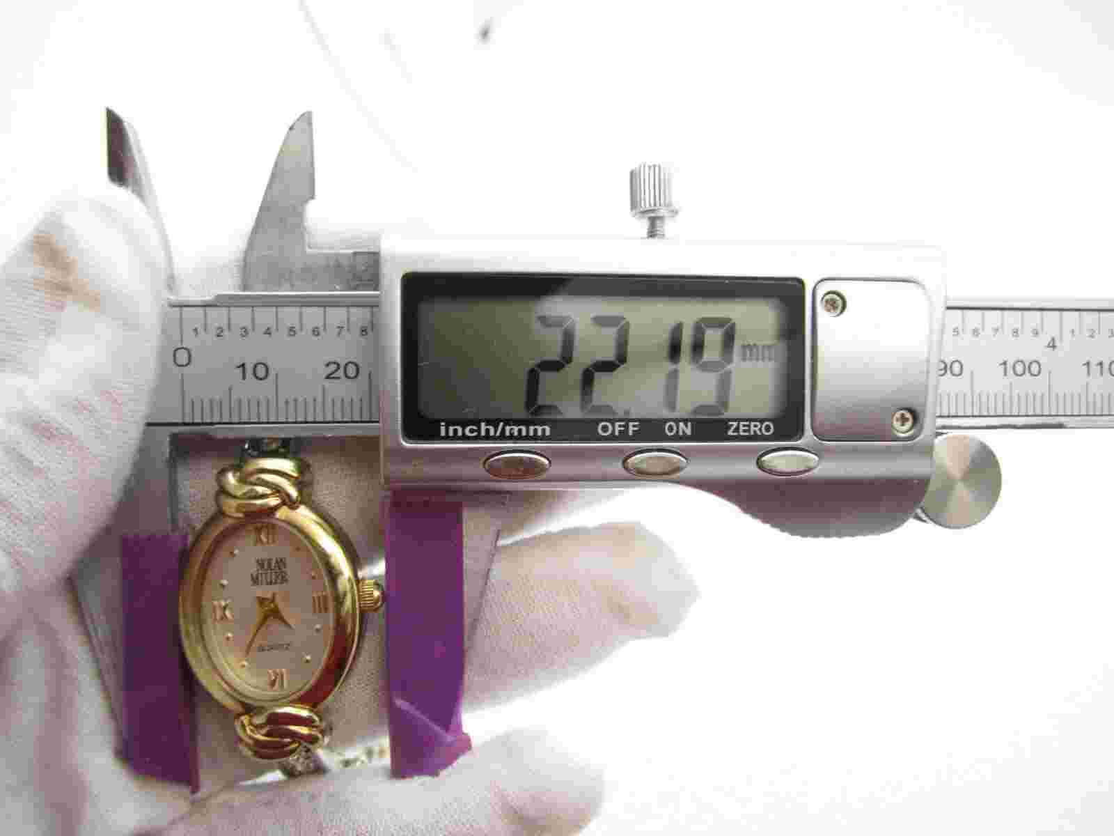 Women Nolan Miller Crystals Quartz WR Analog 22mm Dial Causal Oval Watch (G286)
