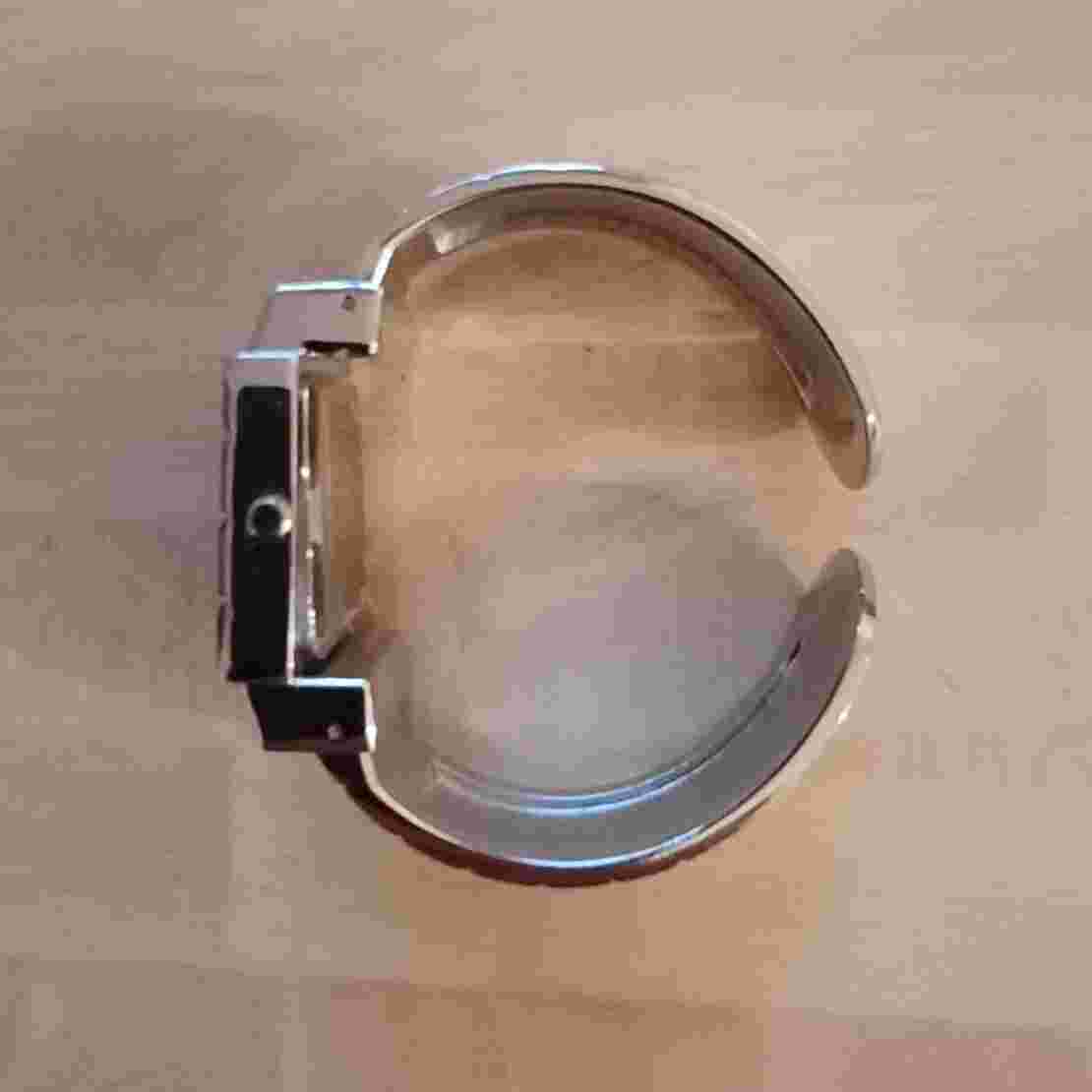 Gino Milano Ladies Wrist Watch / spring loades bangle wrist band strap