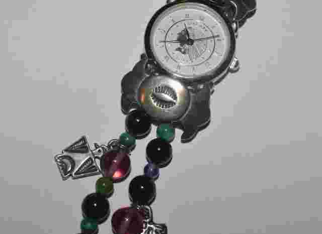 CAROLYN POLLACK RELIOS STERLING SILVER AND MULTIPLE STONES WATCH