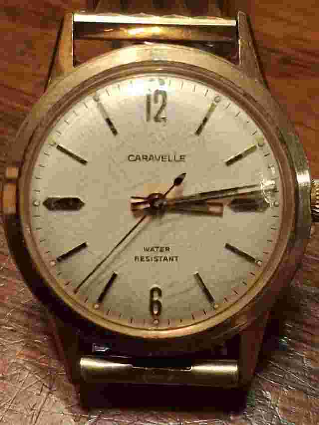 PRE-OWNED MENS GOLD TONE BULOVA CARAVELLE MANUAL WINDWRISTWATCH