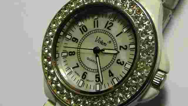 Ladies Vivani MOP dial CZ bezel white bracelet watch 36mm