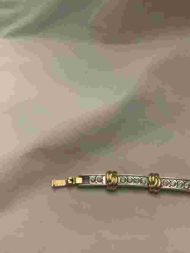 Nolan Miller Quartz Ladies Watch Silver Two Tone Clear Stones