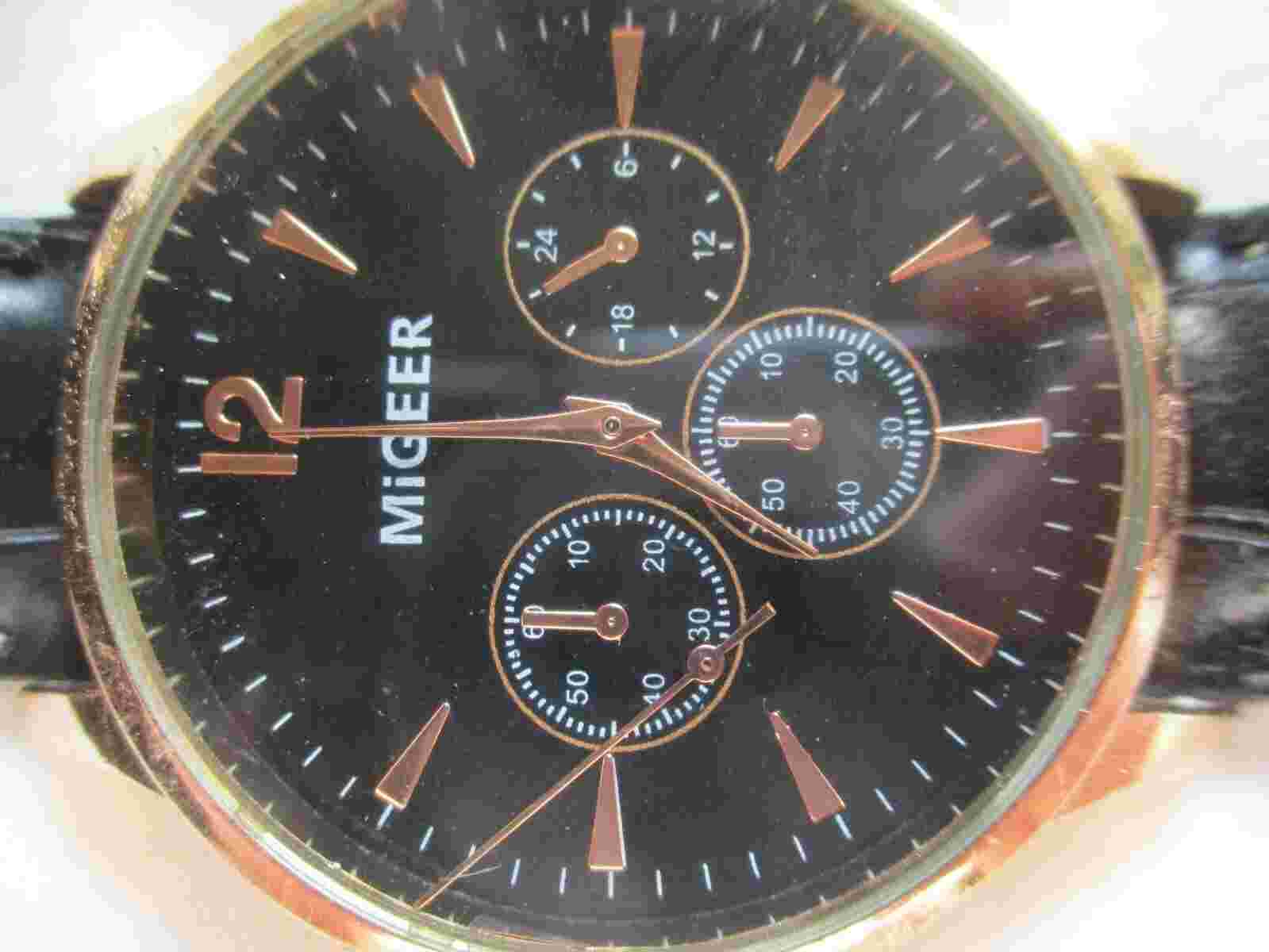 Migeer Analog Wristwatch Black Buckle Band Round Face Rose Gold Tone