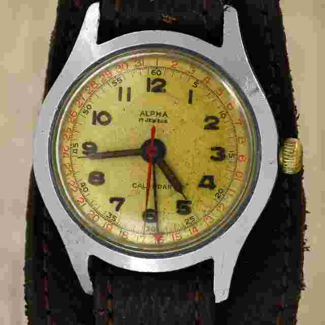 1950's vintage Alpha calendar Swiss made wristwatch pointer date Louvic watch in