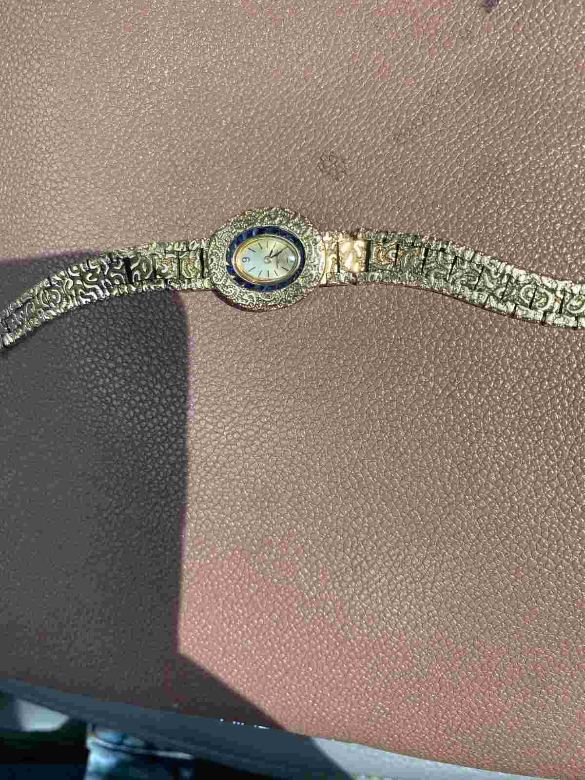 Lucien Piccard womans open face style wrist watch