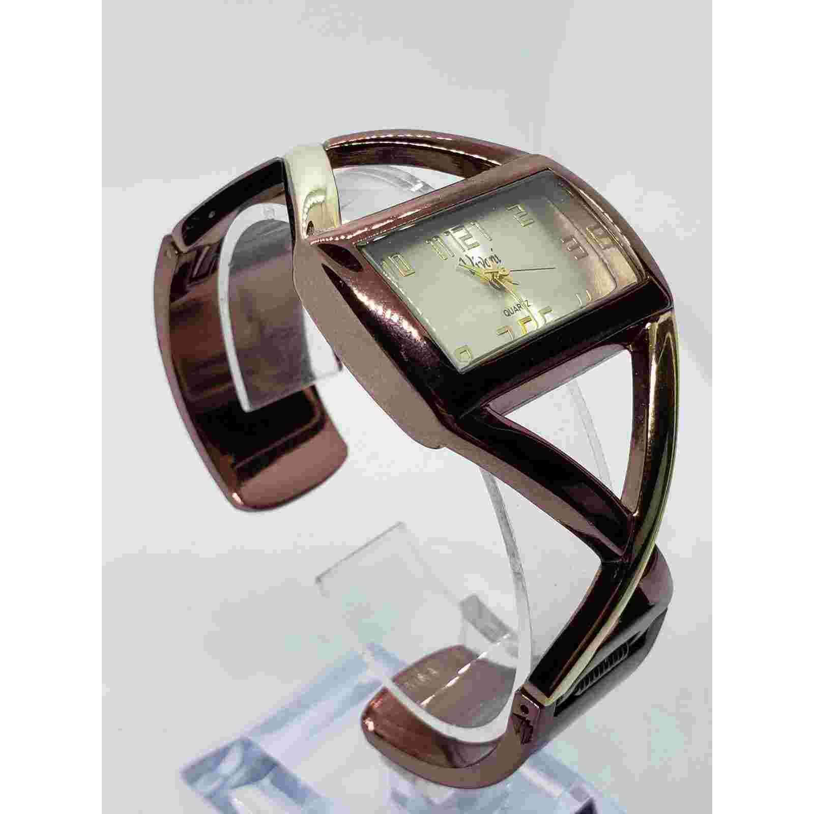 Vivani K2065AKL 0317. Large rectangle silver iridescent face, bangle style band