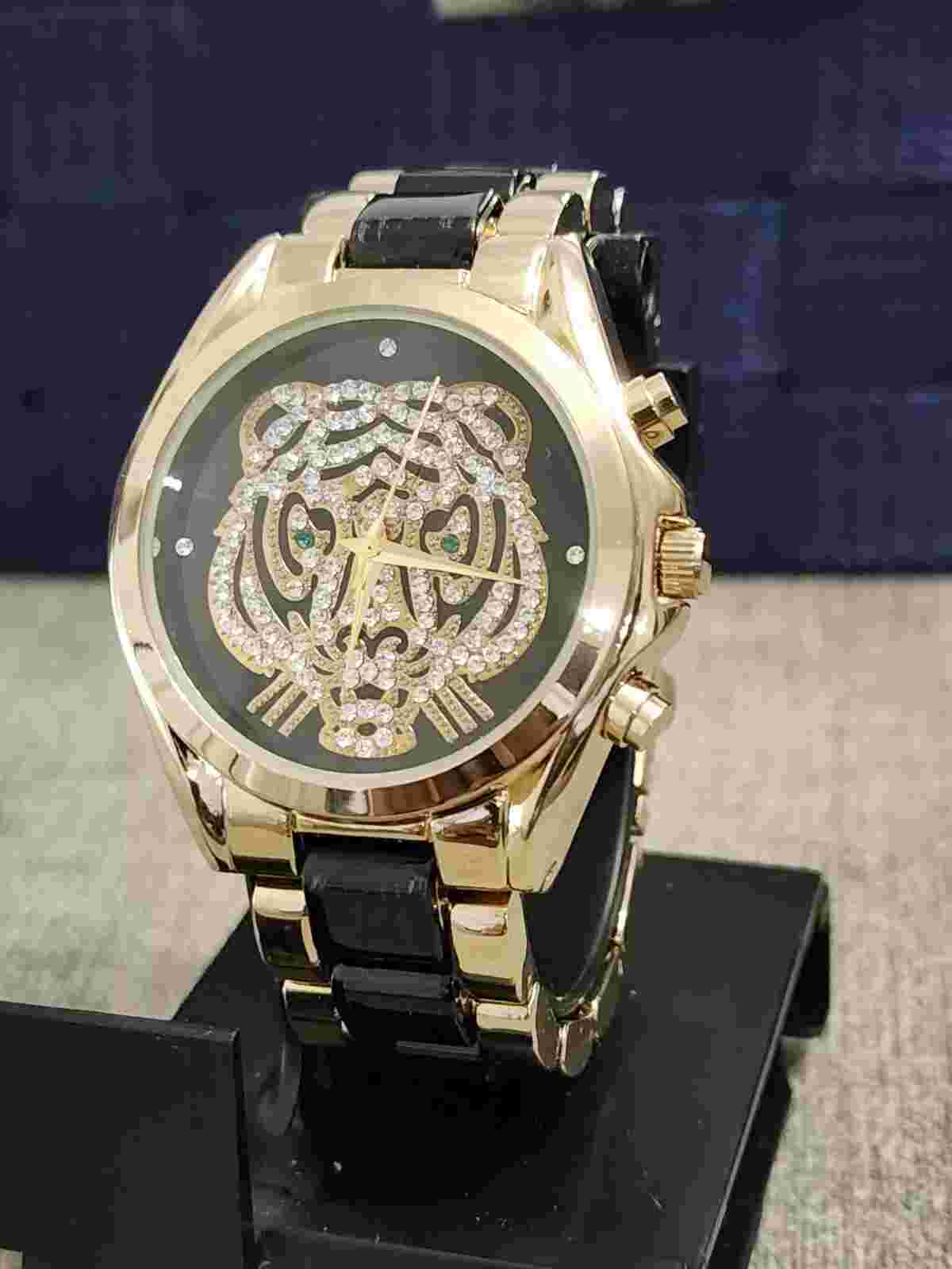 ADRIENNE DESIGNER COLLECTION LIMITED EDITION MEN'S and WOMEN'S WATCH. NEW BATT