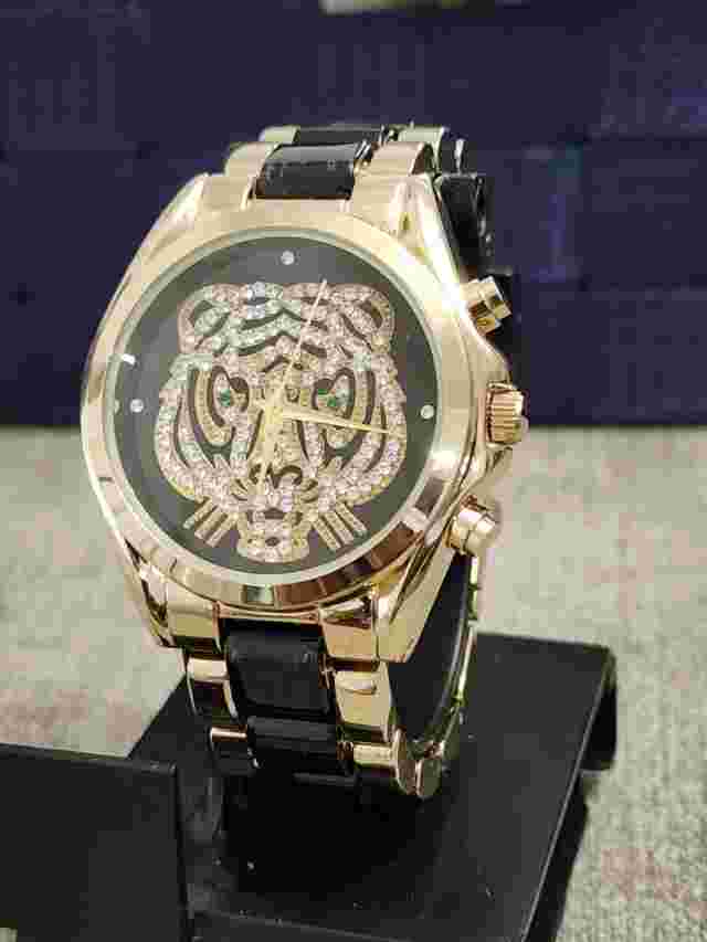 ADRIENNE DESIGNER COLLECTION LIMITED EDITION MEN'S and WOMEN'S WATCH. NEW BATT