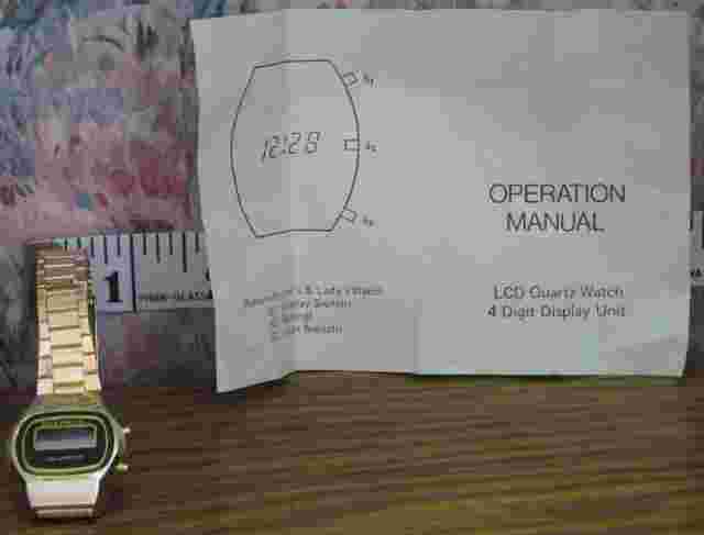 Delphi II LCD Lady's Quartz Digital Wrist Watch - Gold Plated No Battery - 1980s