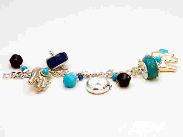 INFINITY:WOMEN'S SILVER FINISH ELEPHANTS/TORQOIS CHARMS BRACELET ANALOG  WATCH