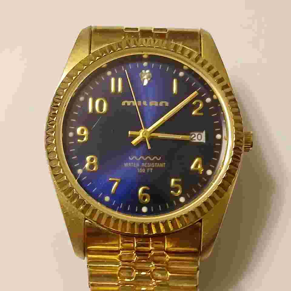 Milan Men Blue Dial Gold Tone Stainless Steel Date Analog Watch WR 100ft MLN734