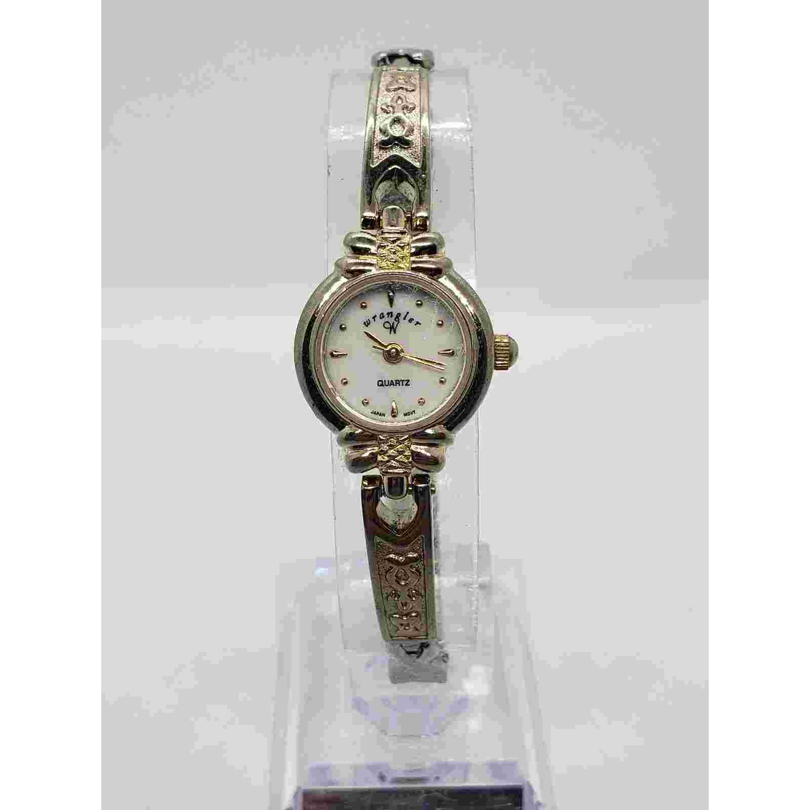 Wrangler women's dress watch. Small round face with decorative band