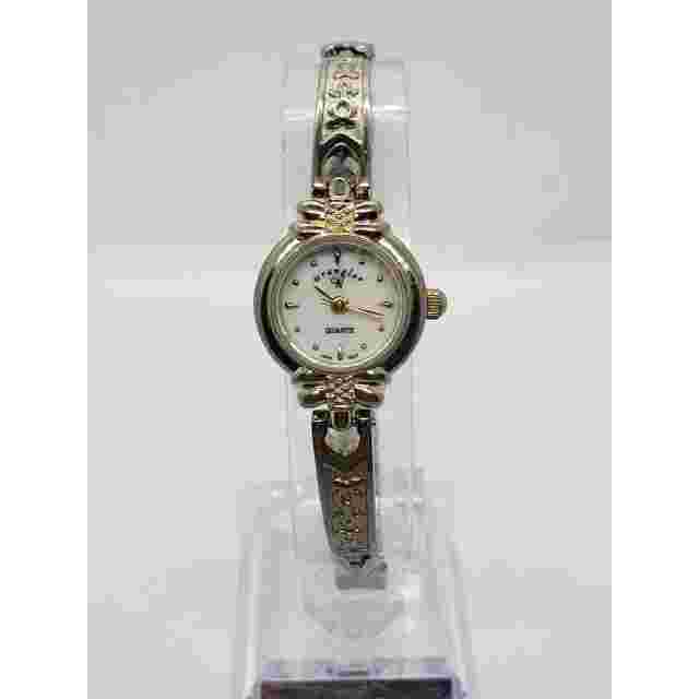Wrangler women's dress watch. Small round face with decorative band