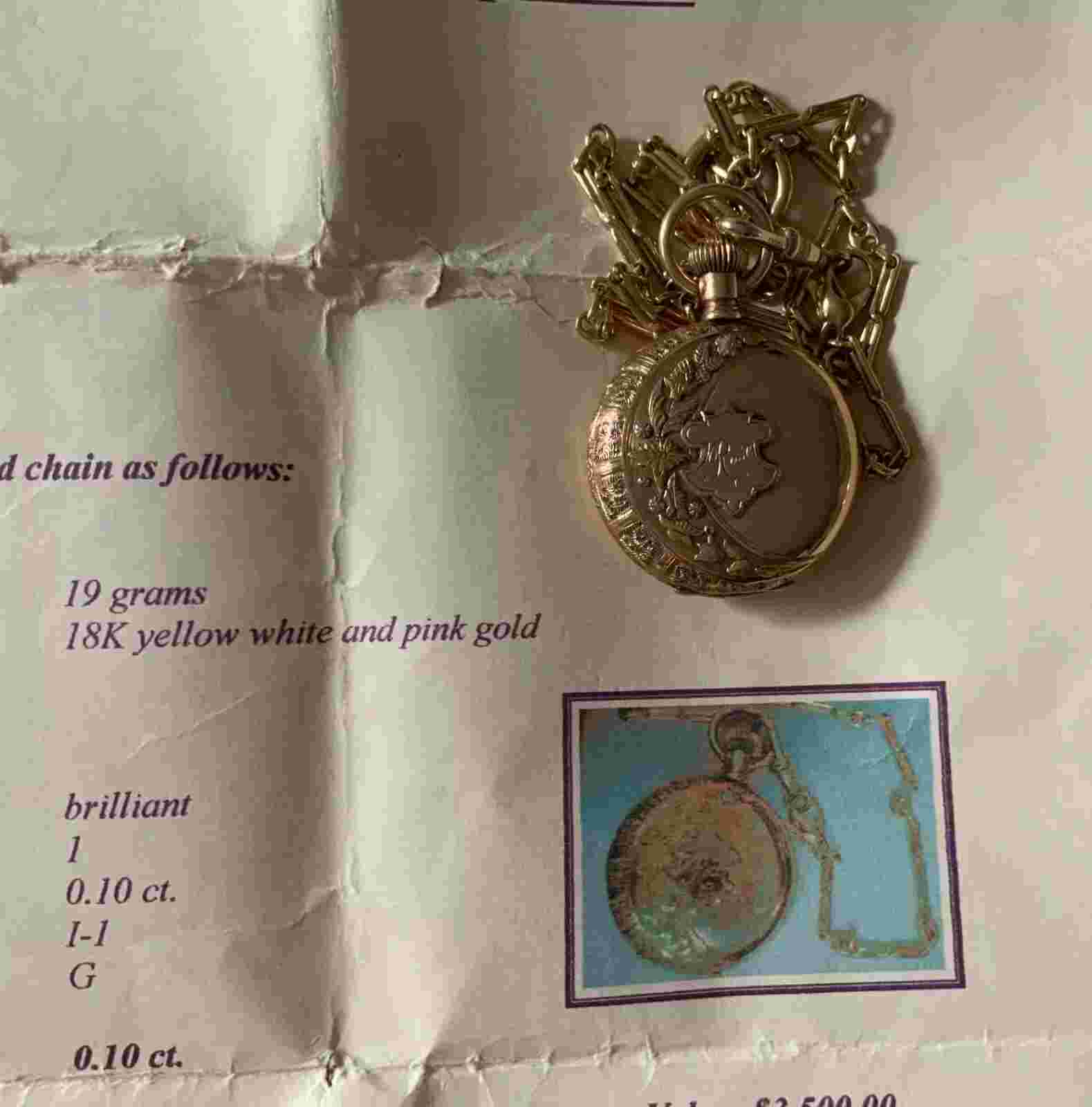 14k solid gold a.w.w.co.  POCKET WATCH with Diamond on case and 18K Gold Chain.